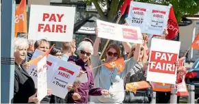  ??  ?? Ministry of Business, Innovation and Employment workers protest in Hamilton back in 2015. Union members employed at the government department, along with thousands of Inland Revenue staff, voted on strike action yesterday. MARK TAYLOR/STUFF