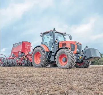  ??  ?? EXTRA OOMPH: The Kubota M7173 tractor – pictured with u-drill – has had a 5hp boost.