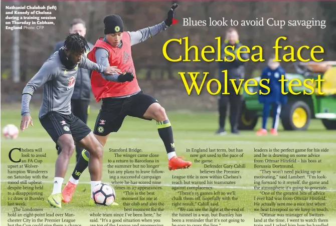  ?? Photo: CFP ?? Nathaniel Chalobah (left) and Kenedy of Chelsea during a training session on Thursday in Cobham, England