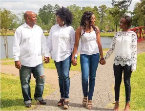  ?? Submitted photo ?? ■ Katina Washington-Levingston, second from left, is shown with her husband Joe and daughters Nakina and Ashanti.