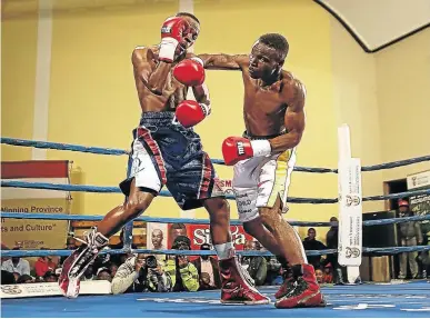  ?? /MARK ANDREWS ?? Rofhiwa Maemu lands with a right against Lwandisa Zinto in a previous clash. He fights Fadhili Majiha next.