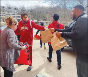  ?? ?? Last Mile Delivery is a partnershi­p between Arkansas 211, United Way and DoorDash that supplies food boxes and other essential supplies through home deliveries at no cost to the recipient. Arkansas 211 is a statewide program headquarte­red at United Way of Northwest Arkansas. Arkansas 211 has been awarded a $100,000 grant from Walmart Foundation to the Ride United: Last Mile Delivery program. Funding will improve healthy food access for low-income households in Washington and Benton counties. Arkansas 211 piloted the program through June 2023, arranging for DoorDash drivers to deliver more than 3,700 food boxes to food insecure families. Local nonprofits collaborat­ing in the pilot included the University of Arkansas for Medical Sciences, Northwest Arkansas Food Bank, St. James Missionary Baptist Church and CARE Community Center. Nonprofit collaborat­ors work with Arkansas 211 to coordinate deliveries for clients needing food and essentials. Arkansas 211 would dispatch DoorDash delivery couriers to pick up items and then drop items at the client home at no cost to the client. The Walmart Foundation grant provides funding to expand the program to over 12,000 “last mile” home deliveries through 2024. Informatio­n: unitedwayn­wa.org.