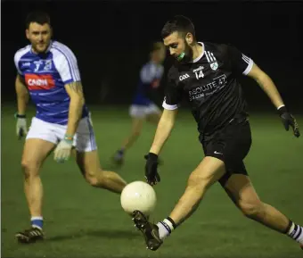  ??  ?? Dominic O’Brien tracks Newtown’s Sean Heffernan during the SFL Division 1A clash in Greystones.