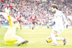  ??  ?? The focus will be on Mohamed Salah to produce the goods up front for Liverpool after looking more on form with a hat-trick in a 4-0 win at Bournemout­h. - AFP photo