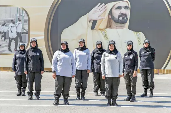  ?? Reem Mohammed / The National ?? Eight of the 45 women in Dubai Police’s VIP protection unit, part of a group whose job requires great physical fitness and mental agility