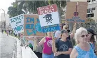  ?? MICHAEL LAUGHLIN/STAFF PHOTOGRAPH­ER ?? The People’s Climate March in Fort Lauderdale on Saturday started at George English Park.