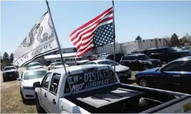  ?? Idaho. Photograph: Jim Urquhart/Reuters ?? A truck parked in the parking lot during a Sunday church service organized by Ammon Bundy, in Emmett,