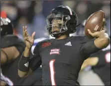  ?? Associated Press ?? Louisiana-Lafayette quarterbac­k Levi Lewis (1) throws a pass during the first half of the team’s NCAA college football game against Georgia State in Lafayette, La. on Thursday.