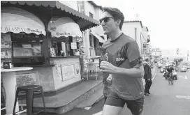  ?? SEAN KILPATRICK, THE CANADIAN PRESS ?? Prime Minister Justin Trudeau goes for a run in Taormina, Italy on Saturday after the G7 summit.