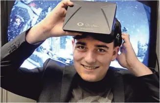  ?? FILE PHOTO BY ROBERT HANASHIRO, USA TODAY ?? Palmer Luckey, shown in 2013 shortly after creating the Oculus Rift. Facebook bought Oculus for $2 billion in 2014. Luckey’s net worth reportedly is $700 million.