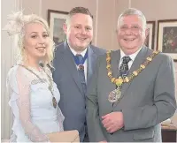  ??  ?? Mayor of Hyndburn Coun Peter Britcliffe with Mayoress his daughter Sara and Consort, son Dominic. Right: Geoffrey Hanson is awarded Freedom of the Borough