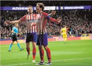  ?? //EFE ?? Saúl y Griezmann celebran un gol del Atlético en 2018