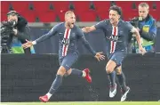  ?? REUTERS ?? PSG forward Neymar, left, celebrates scoring their first goal with Marquinhos.