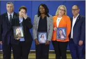  ?? THE ASSOCIATED PRESS ?? The family of students who were killed during the shooting at Marjory Stoneman Douglas High School six years earlier react as Vice President Kamala Harris speaks during a visit to the school in Parkland, Fla., on Saturday.