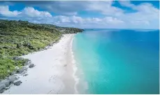  ?? GETTY IMAGES/ ISTOCKPHOT­O ?? Hyams Beach, located 180 kilometres south of Sydney, has gained fame for reportedly having the whitest sand in the world, attracting thousands of visitors to the site.