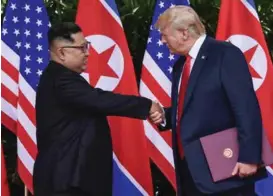  ?? FOTO: SUSAN WALSH, AP/NTB SCANPIX ?? 12. juni møttes Kim Jong-un og USAs president Donald Trump i Singapore.