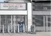  ?? PHOTO: REUTERS ?? Match postponed: Gates at the San Siro are locked after Inter Milan’s game against Sampdoria was called off.