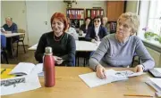  ?? Reuters ?? Anxious: Russian-speaking Latvian citizens attend a Latvian language learning class in the capital, Riga. /