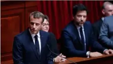  ??  ?? French President Emmanuel Macron addresses both the upper and lower houses of the French parliament at a special session in Versailles, near Paris on Monday. AP PhoTo/ThIbAulT CAmus