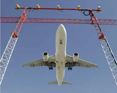  ?? ADRIAN WYLD/THE CANADIAN PRESS FILE PHOTO ?? The British consultanc­y Skytrax, which ranks the world’s top 100 airlines, lists Air Canada at 31st (down from 27th in 2015).