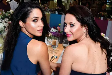  ??  ?? MESSAGES OF SUPPORT: Meghan, left, with best friend Jessica Mulroney. Right: American broadcaste­r Gayle King spoke out on her radio show