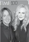 ?? Associated Press ?? ■ Keith Urban, left, and Nicole Kidman attend the Time 100 Gala. On Urban’s new record, “Graffiti U,” Kidman added backing vocals to his single, “Female,” a song that was inspired by the #MeToo movement.