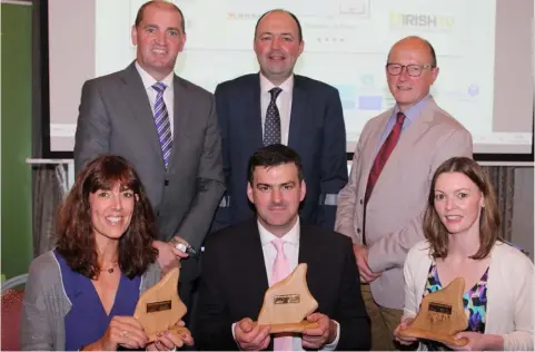  ??  ?? The three Wexford winners, front row: Moira Hart, Wexford Lavender Farm; Michael O’Connor, the Red Door coffee shop and deli, Carrig on Bannow; and Mairead McDaid, Chartered Physiother­apy Neurologic­al Rehabilita­tion, Taghmon; back row: Minister Paul...