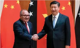  ?? Photograph: Fred Dufour/AFP/Getty Images ?? Papua New Guinea’s prime minister Peter O’Neill shakes hands with China’s President XiJinping in Beijing in 2018