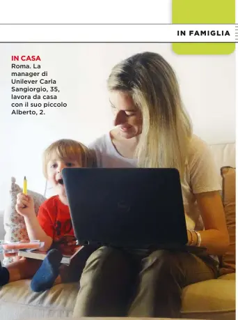  ??  ?? Roma. La manager di Unilever Carla Sangiorgio, 35, lavora da casa con il suo piccolo Alberto, 2.