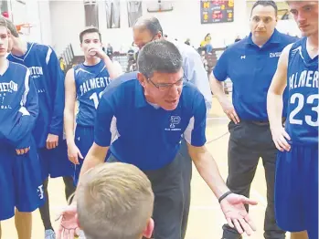  ?? MORNING CALL FILE PHOTO ?? Palmerton coach Ken Termini talks with his team during a timeout last year at Catasauqua. The Blue Bombers are a team to watch this winter in the Colonial League after making the district playoffs last year for the first time since 2002.