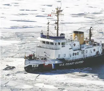  ?? FILES ?? Unidentifi­ed debris from a plane sits above the ice, left, on Jan. 18, 2004, as the U.S. Coast Guard Cutter Neah Bay posts itself near the site where a charter flight from Pelee Island to Windsor Airport crashed about a half-mile off the island into Lake Erie, killing 10 people. A civil trial into the 15-year-old crash is to begin Monday.