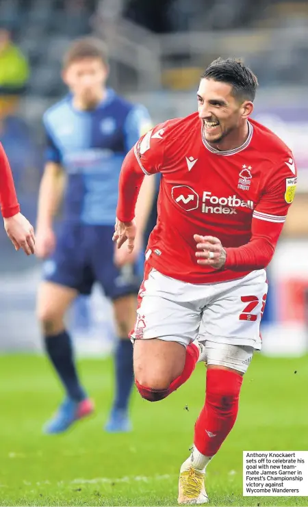  ??  ?? Anthony Knockaert sets off to celebrate his goal with new teammate James Garner in Forest’s Championsh­ip victory against Wycombe Wanderers