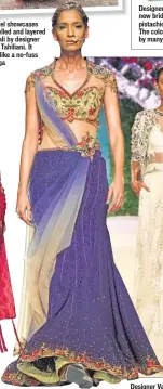  ??  ?? A model showcases a panelled and layered anarkali by designer Tarun Tahiliani. It looks like a no-fuss lehenga Designer Mandira Wirk’s pre-draped sari Designer Ridhi Mehra’s new bridal collection has pistachio green anarkalis. The colour is being...