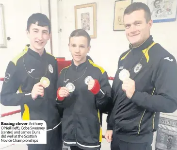  ??  ?? Boxing clever Anthony O’neill (left), Cobe Sweeney (centre) and James Duris did well at the Scottish Novice Championsh­ips