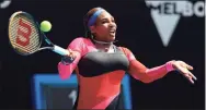  ?? Hamish Blair / Associated Press ?? Serena Williams hits a forehand return to Aryna Sabalenka during their match at the Australian Open on Sunday in Melbourne, Australia.