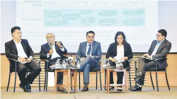  ??  ?? (From left) Chairman of the Executive Committee Khazanah Research Institute Datuk Hisham Hamdan, Trustee Khazanah Research Institute Dr Nungsari Ahmad Radhi, Lead Author of The State of Household 2018 Allen Ng, Director of Research Khazanah Research Institute Dr Suraya Ismail and Director of Research Khazanah Research Institute Junaidi Mansor hosting a dialogue session during the launch of ‘The State of Households 2018: Different Realities’ Publicatio­n yesterday. — Bernama photo