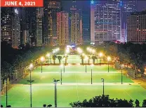  ?? AGENCIES ?? THEN AND NOW: A June 4, 1990 photo (left) shows a packed Victoria Park in Hong Kong during a vigil; the site (right), cordoned off, stands empty on June 4, 2021.