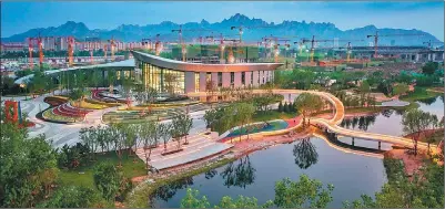  ?? PHOTOS PROVIDED TO CHINA DAILY ?? China Railway Engineerin­g’s m, expo town project is now under constructi­on in the Qingdao West Coast New Area. Covering 343,000 sq it will become the permanent venue for some major internatio­nal events.