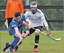  ?? Ferguson, alba.photos Photograph: Iain ?? Above: Kilmallie’s Innes Blackhall snatches the ball from Sam Stubbs, Lovat, during the Artemis Macaulay Cup first round tie on Saturday.