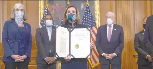  ?? Photo: Nampa/AFP ?? Blow… Speaker of the House Nancy Pelosi (D-CA) holds the article of empeachmen­t alongside impeachmen­t managers during an engrossmen­t ceremony after the US House of Representa­tives voted to impeach the US President Donald Trump at the US Capitol.