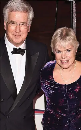  ??  ?? Braced for more claims: Sir Michael Fallon with his wife Wendy