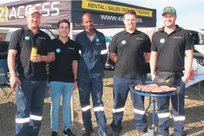  ??  ?? Eazi Access Richards Bay sponsored the machinery and equipment to erect the ZO Madiba Day washing line outside the Richards Bay Civic Centre and sold boerewors rolls to raise funds for DICE