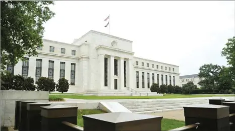  ??  ?? The US Federal Reserve building in Washington, DC. The Fed yesterday said it was soliciting input on imposing stricter liquidity requiremen­ts on foreign bank branches for the first time, although it stopped short of proposing new rules.