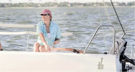  ?? Kim Christense­n photos / For the Chronicle ?? Karen Penrose, a visually impaired sailor, practices sailing as she prepares for an internatio­nal competitio­n in Chicago. “I just love being out on the water,” she says.