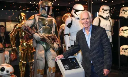  ?? Photograph: Pete Summers/REX/Shuttersto­ck ?? Jeremy Bulloch with the Boba Fett costume at a Star Wars exhibition in London in 2017.