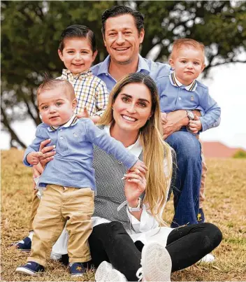  ?? Melissa Phillip / Staff photograph­er ?? Blanca Lozano and her husband, Jorge Gomez, with sons, Jorge, 3, left, and 1-year-old twins, Santiago, front left, and Marcello, credit Santiago’s doctors with saving his life.