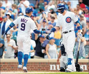  ?? CHRIS SWEDA/CHICAGO TRIBUNE ?? The Cubs may consider trading either Javier Baez, left, or Kris Bryant during the offseason.