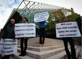  ?? ?? ‘Form of therapy’: Campaigner­s staging a protest outside a Canadian court