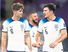  ?? ?? Defenders John Stones, left, and Harry Maguire.