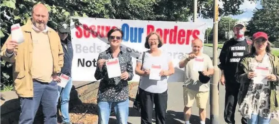  ??  ?? Protesters outside the Daresbury Park Hotel